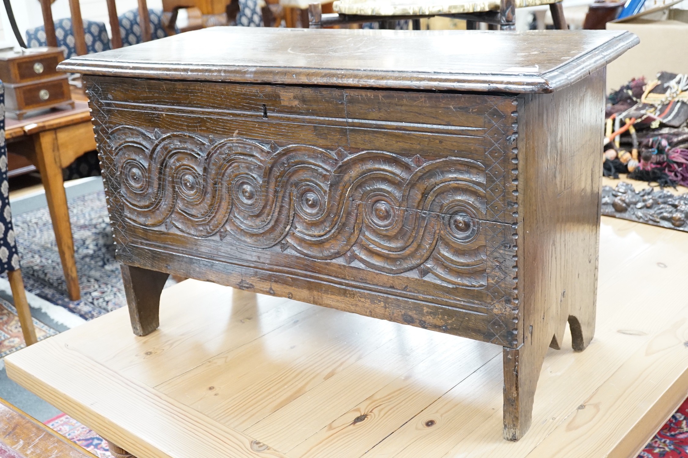 A 17th century style carved oak coffer, width 84cm *Please note the sale commences at 9am.